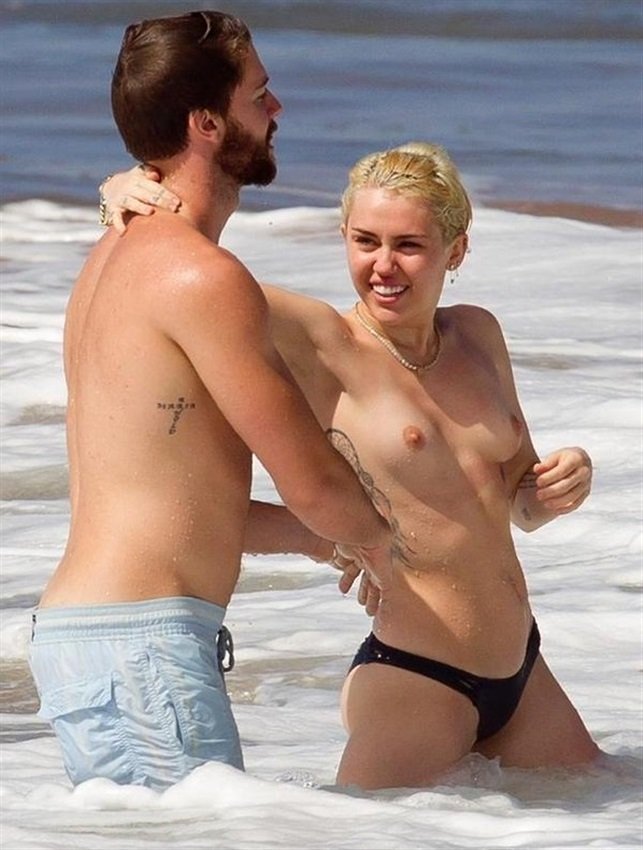 Miley Cyrus Topless In Sea 3