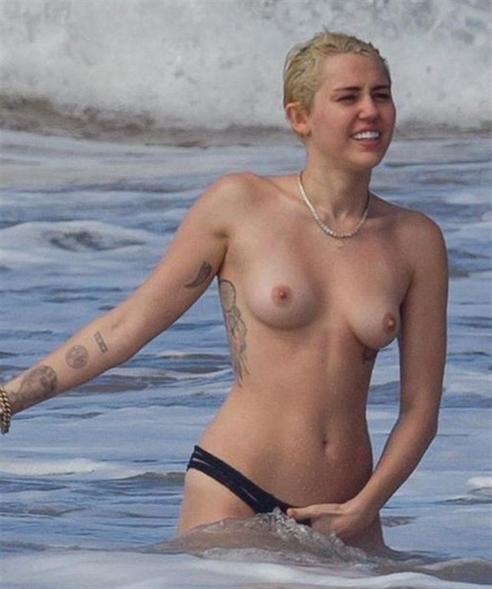 Miley Cyrus Topless In Sea 5